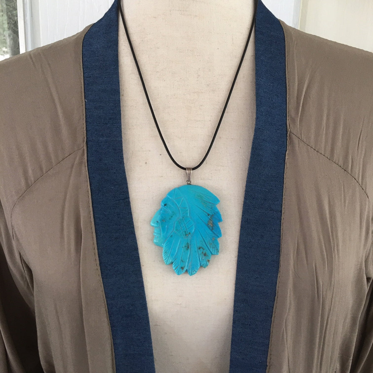 Vintage Navajo Carved Turquoise Chief Pendant
