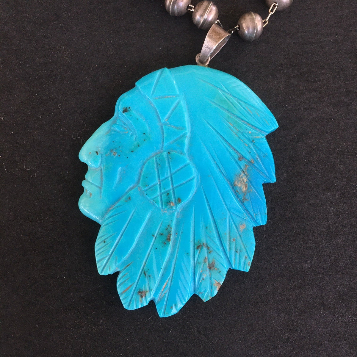 Vintage Navajo Carved Turquoise Chief Pendant