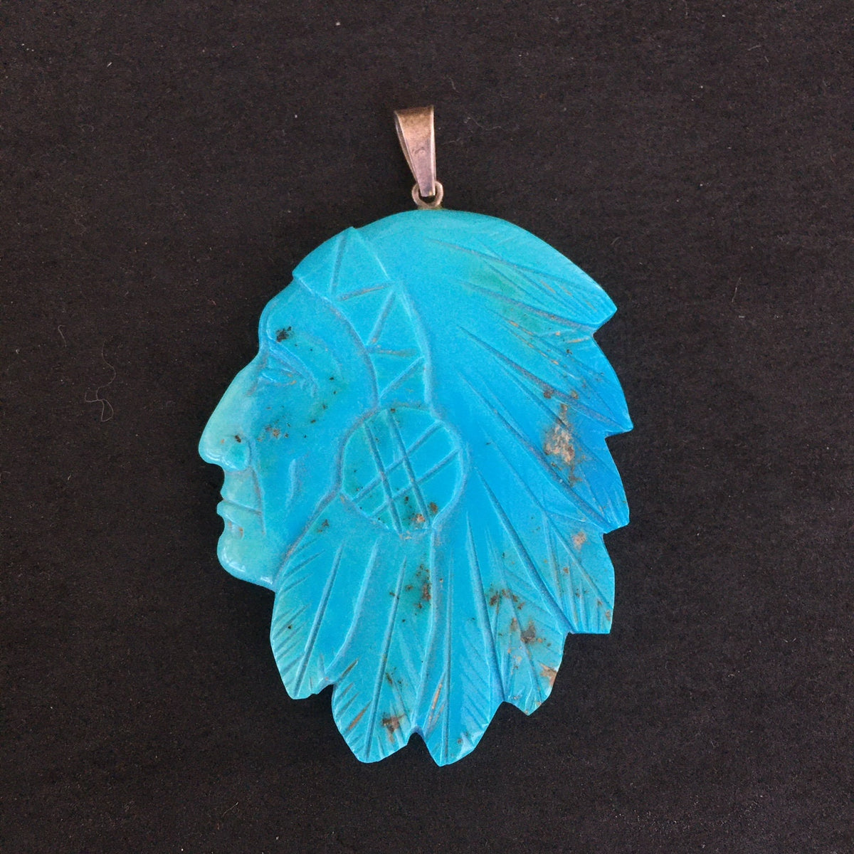 Vintage Navajo Carved Turquoise Chief Pendant