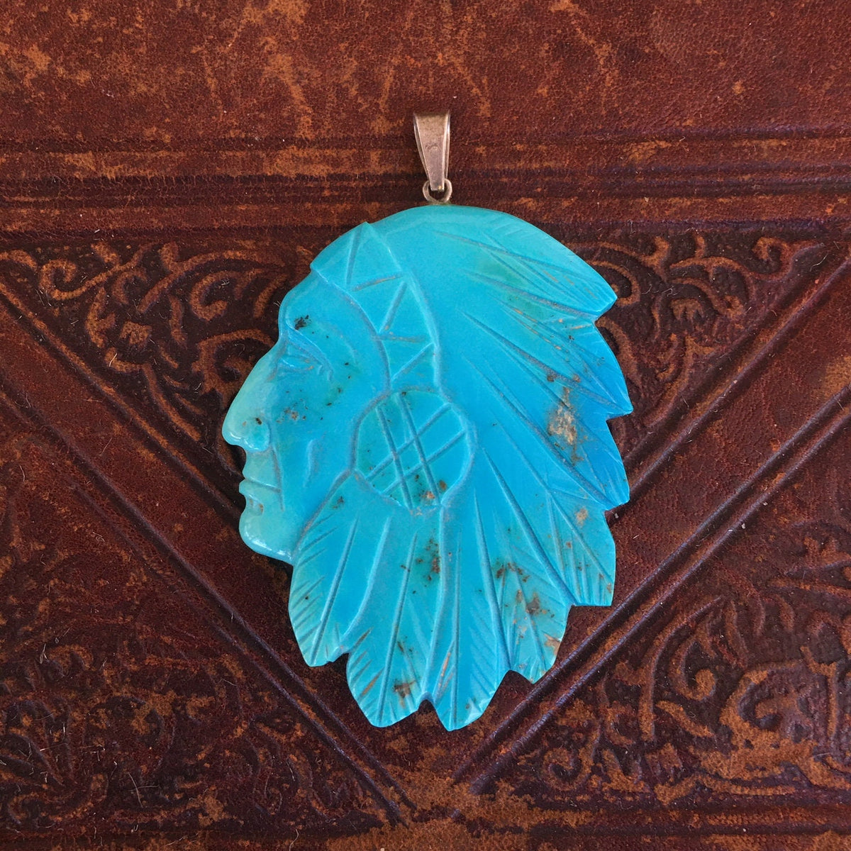 Vintage Navajo Carved Turquoise Chief Pendant