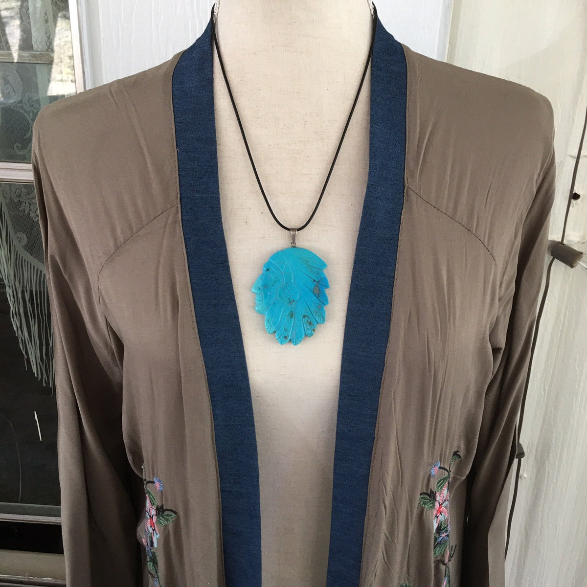 Vintage Navajo Carved Turquoise Chief Pendant