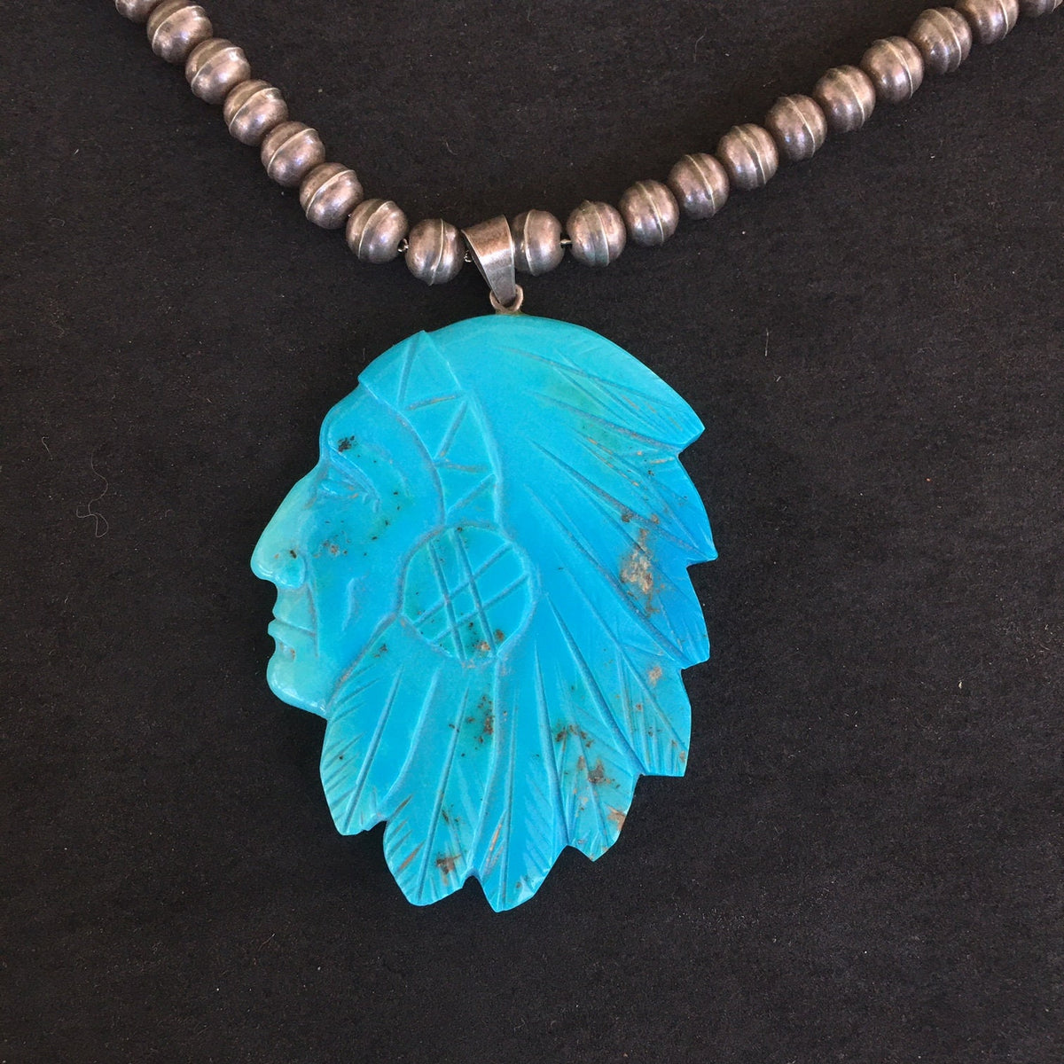Vintage Navajo Carved Turquoise Chief Pendant