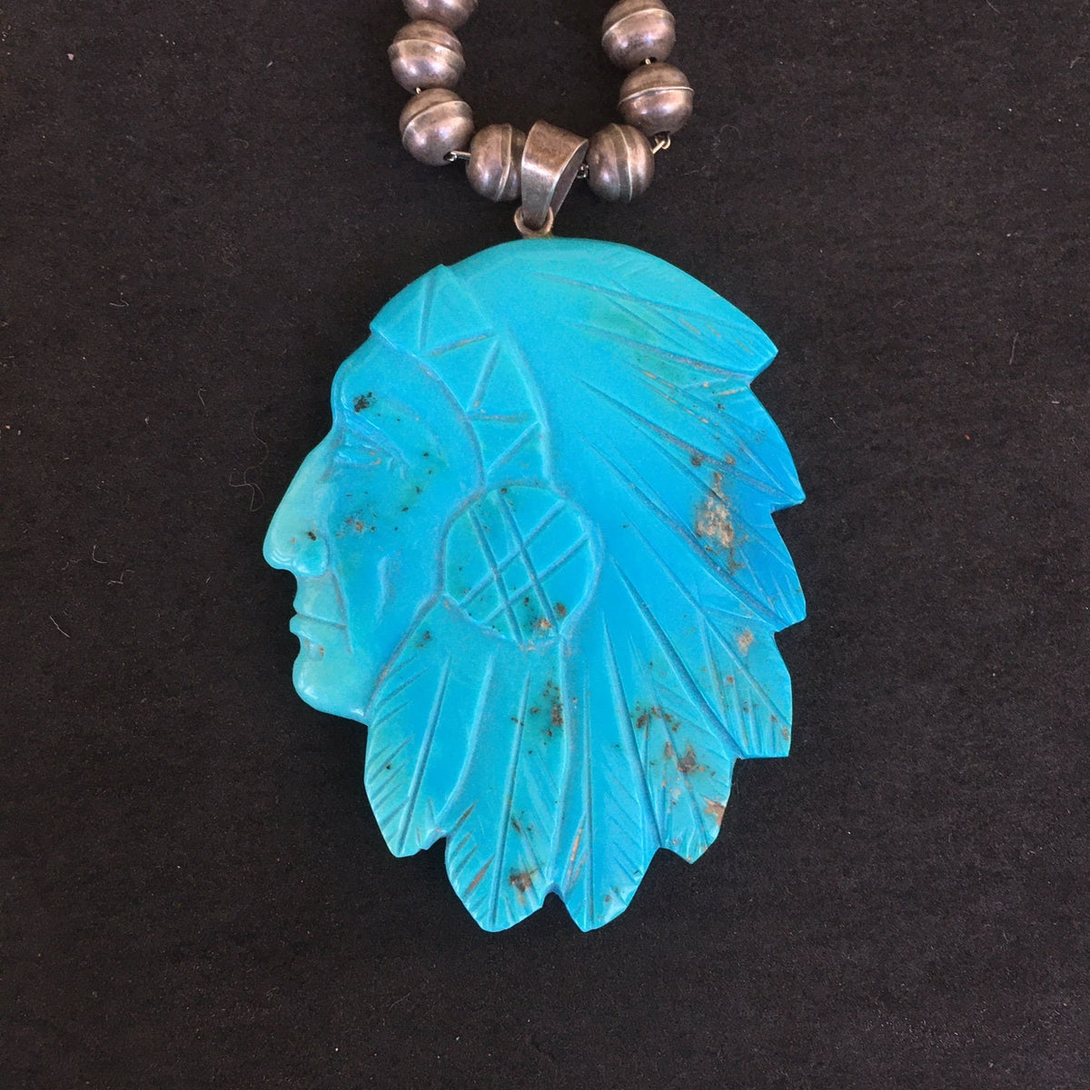 Vintage Navajo Carved Turquoise Chief Pendant